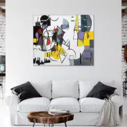 peinture toile abstraite Kandinsky sur un mur blanc dans un salon moderne au dessus d'un canapé blanc aux coussins noirs.
