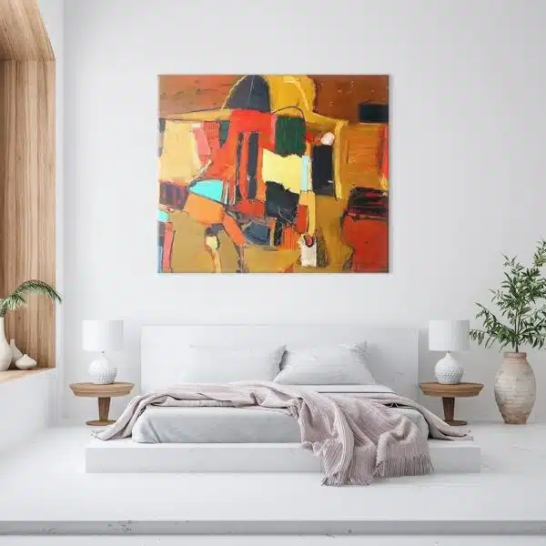 tableau cubisme marron rouge et jaune dans une grande chambre moderne aux tons blancs et boisés.