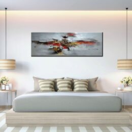 Tableau panoramique gris orange noir légers reliefs. Bonne qualité, très original, accrochée sur un mur au-dessus d'un lit dans une chambre.