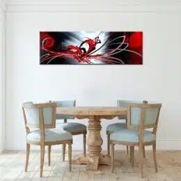 Tableau abstrait rouge et noir panoramique, Bonne qualité, très original, accrochée sur un mur au dessus d'une table avec des chaises dans une maison