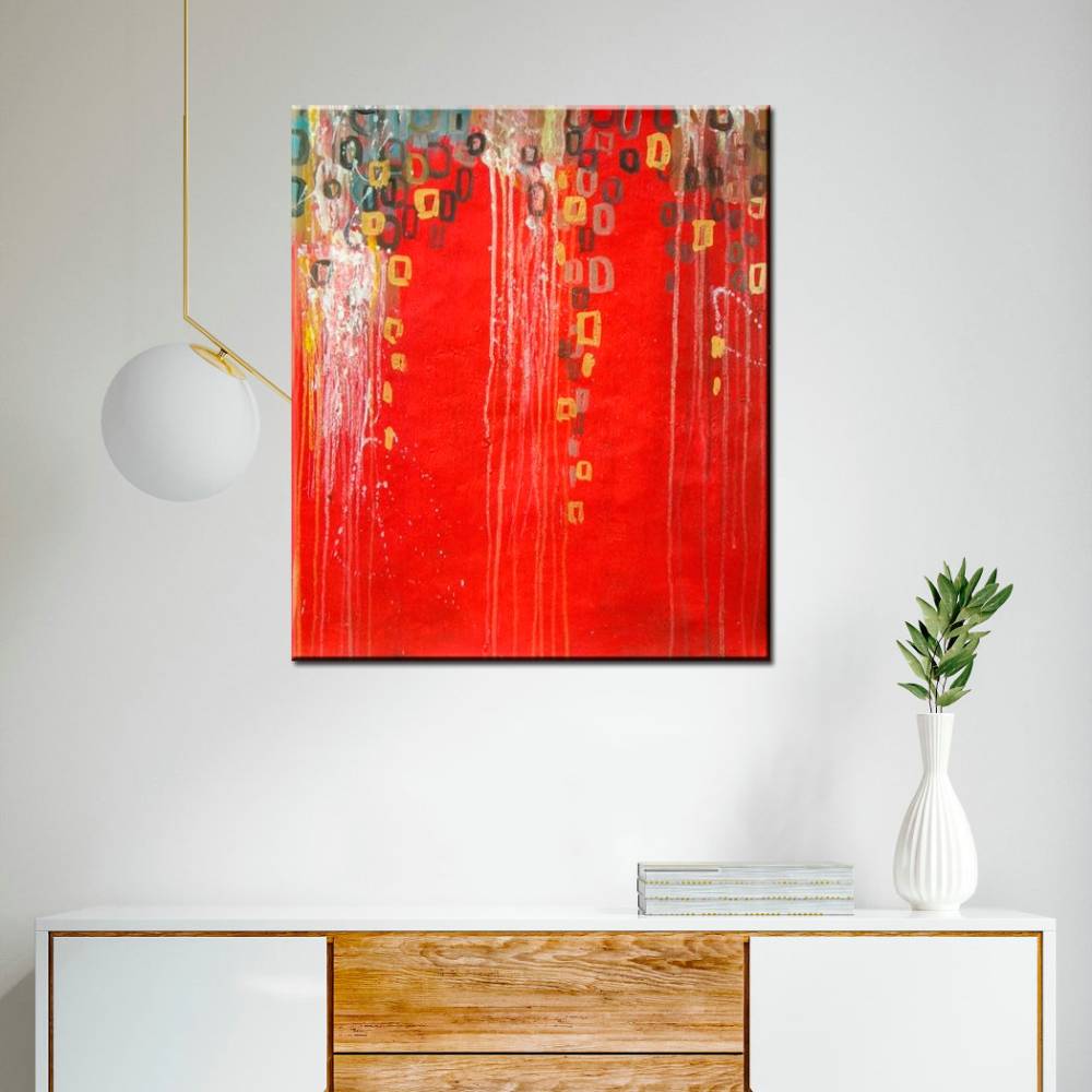 Peinture abstraite rouge et or Peinture abstraite rouge et orange, bonne qualité et très original. Accrochée sur le mur au-dessus d'une table avec une vase dans un salon