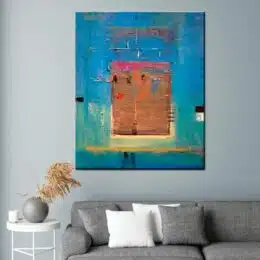 Peinture abstraite sur toile bleue marron. Bonne qualité, très original, accrochée sur un mur au-dessus d'un canapé dans un salon.