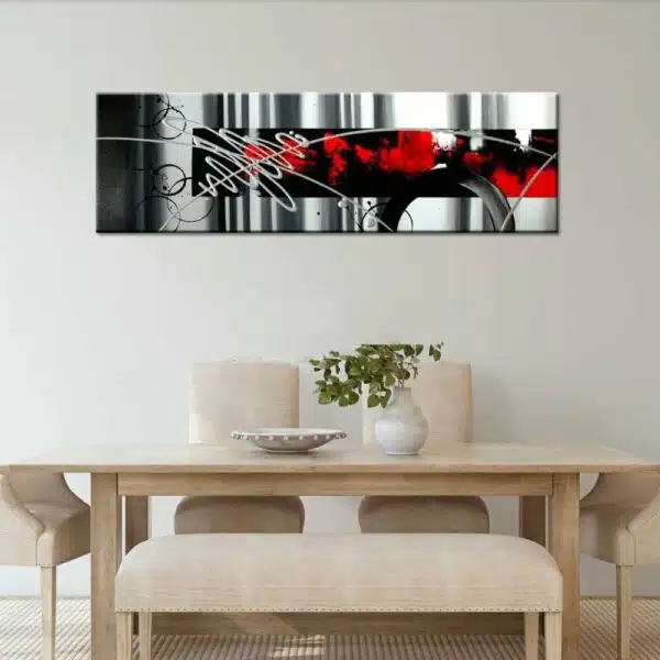 Tableau panoramique gris rouge et noir peinture abstraite. Bonne qualité, très original, accrochée sur un mur au dessus d'une table dans une maison