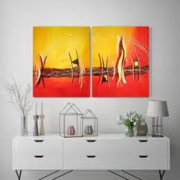 Tableau dyptyque abstrait rouge orange accrochée sur un mur dans un salon