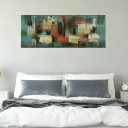 Tableau peinture sur toile panoramique kaki effets au couteau. Accroché sur un mur avec un lit dans une maison