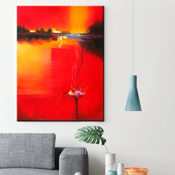 Peinture abstraite moderne orange et noir. Bonne qualité, original, accrochée sur un mur au dessus d'un canapé dans un salon