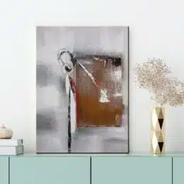 Peinture abstraite grise et beige. Bonne qualité, original, accrochée sur un mur au-dessus d'une table dans une maison