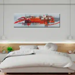 Tableau panoramique gris orange rouge abstrait. Bonne qualité, très original, accrochée sur un mur au-dessus d'un lit dans une maison