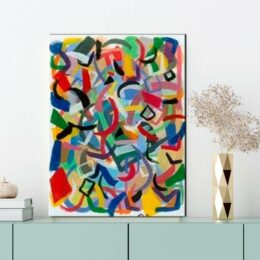 Peinture abstraite multicolore. Bonne qualité, très original, accrochée sur un mur, au-dessus d'une table dans une maison