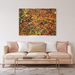 Tableau jackson pollock peinture abstraite sur toile accroché sur un mur avec un canapé dans une maison
