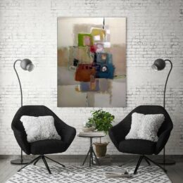 Tableau abstrait gris, accrochée sur un mur avec deux canapés dans une maison