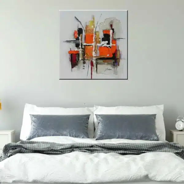 Tableau xxl abstrait gris orange noir, peinture huile sur toile. Accroché sur un mur avec un lit dans une chambre