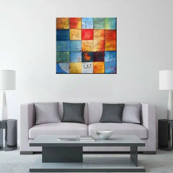 Peinture abstraite sur toile carrés multicolores, art-déco, véritable huile sur toile. Accroché sur un mur avec un canapé dans un salon