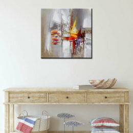 Tableau xxl beige blanc orange jaune effets parmes, bonne qualité, très original accrochée sur un mur au-dessus d'une table dans un salon.