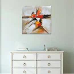 Tableau xxl abstrait beige blanc orange, bonne qualité, très original, accrochée sur un mur au-dessus d'une table dans une maison.