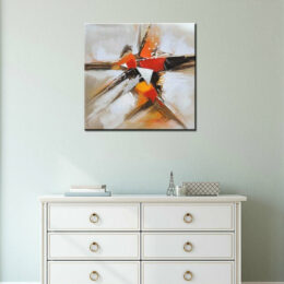Tableau xxl abstrait beige blanc orange, bonne qualité, très original, accrochée sur un mur au-dessus d'une table dans une maison.