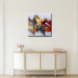 Peinture abstraite gris rouge jaune, art-déco. Bonne qualité, très original accrochée sur un mur au-dessus d'une table dans une maison.