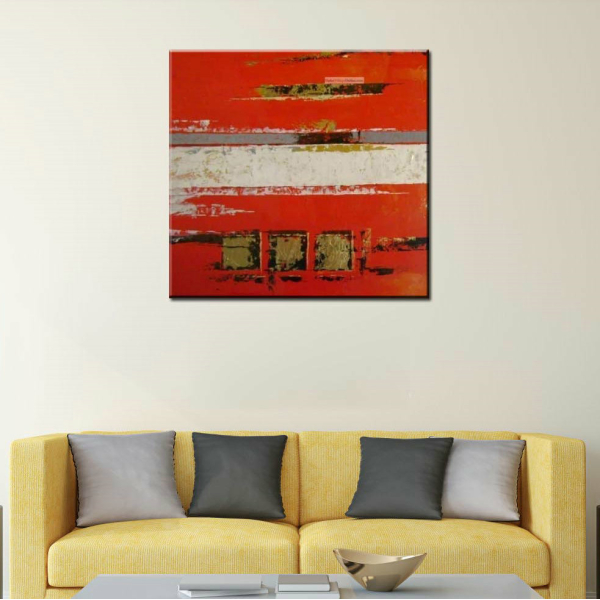 Peinture abstraite sur toile rouge blanc et or, art-déco. Bonne qualité et très original, accrochée sur un mur au-dessus d'un canapé dans une maison.